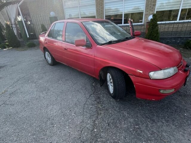 Красный Киа Другая, объемом двигателя 1.5 л и пробегом 245 тыс. км за 1100 $, фото 10 на Automoto.ua