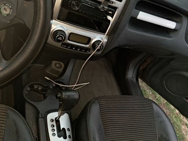 Серый Киа Другая, объемом двигателя 2 л и пробегом 315 тыс. км за 3313 $, фото 5 на Automoto.ua