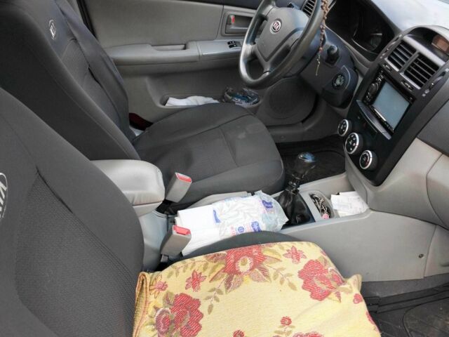 Синий Киа Другая, объемом двигателя 1.6 л и пробегом 269 тыс. км за 5100 $, фото 5 на Automoto.ua