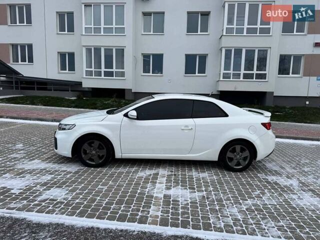 Белый Киа Форте, объемом двигателя 2 л и пробегом 209 тыс. км за 7500 $, фото 9 на Automoto.ua