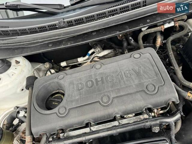 Белый Киа Форте, объемом двигателя 2 л и пробегом 209 тыс. км за 7500 $, фото 29 на Automoto.ua