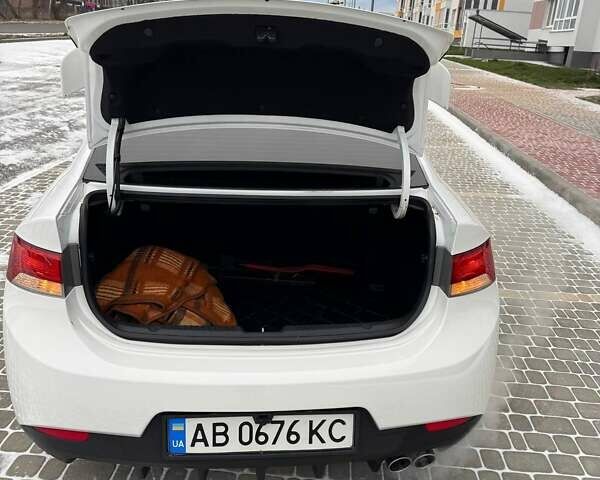 Белый Киа Форте, объемом двигателя 2 л и пробегом 209 тыс. км за 7500 $, фото 39 на Automoto.ua