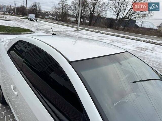 Белый Киа Форте, объемом двигателя 2 л и пробегом 209 тыс. км за 7500 $, фото 23 на Automoto.ua