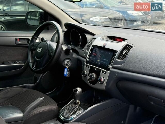 Білий Кіа Форте, об'ємом двигуна 2 л та пробігом 210 тис. км за 7990 $, фото 38 на Automoto.ua