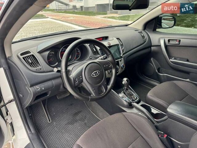 Белый Киа Форте, объемом двигателя 2 л и пробегом 209 тыс. км за 7500 $, фото 37 на Automoto.ua