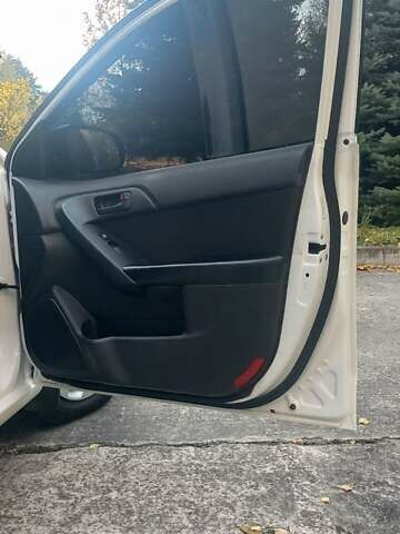 Киа Форте 2012 в Нетешине на Automoto.ua Белый Киа Форте, объемом двигателя 2 л и пробегом 213 тыс. км за 7400 $, фото 14 на Automoto.ua