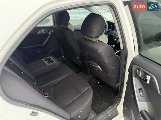 Білий Кіа Форте, об'ємом двигуна 2 л та пробігом 192 тис. км за 7500 $, фото 13 на Automoto.ua
