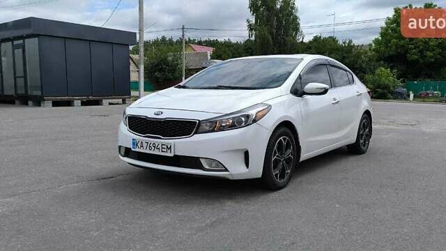 Белый Киа Форте, объемом двигателя 1.8 л и пробегом 94 тыс. км за 11500 $, фото 14 на Automoto.ua