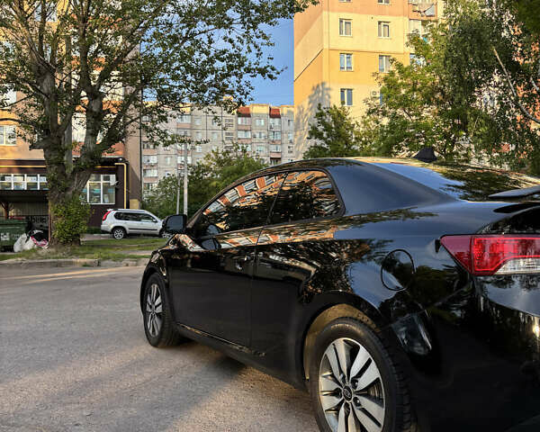 Черный Киа Форте, объемом двигателя 2 л и пробегом 202 тыс. км за 7500 $, фото 2 на Automoto.ua