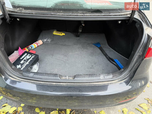Черный Киа Форте, объемом двигателя 1.8 л и пробегом 141 тыс. км за 8500 $, фото 13 на Automoto.ua