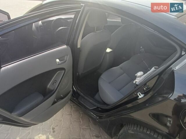 Чорний Кіа Форте, об'ємом двигуна 2 л та пробігом 145 тис. км за 9900 $, фото 22 на Automoto.ua