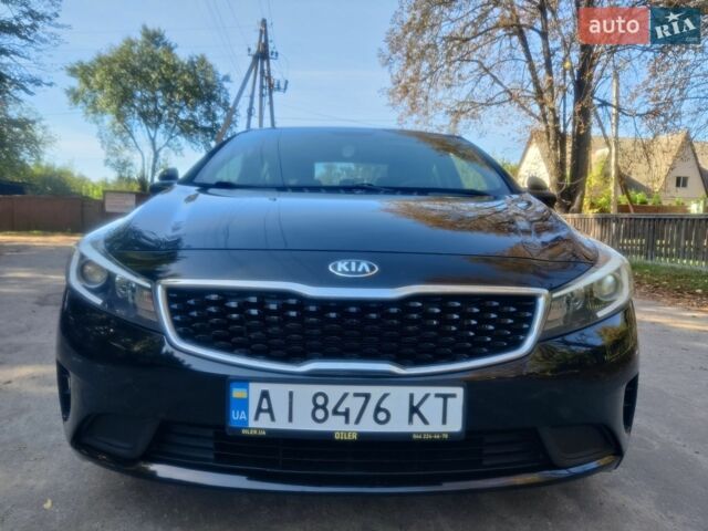 Чорний Кіа Форте, об'ємом двигуна 2 л та пробігом 176 тис. км за 9800 $, фото 1 на Automoto.ua