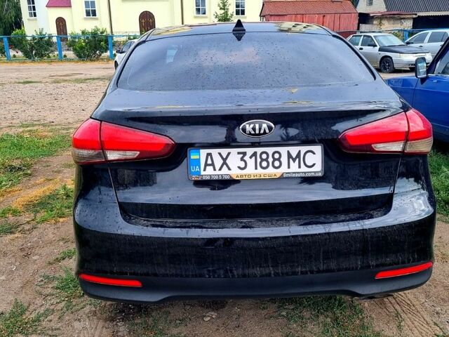 Черный Киа Форте, объемом двигателя 2 л и пробегом 170 тыс. км за 10000 $, фото 1 на Automoto.ua