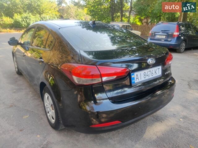 Чорний Кіа Форте, об'ємом двигуна 2 л та пробігом 176 тис. км за 9800 $, фото 30 на Automoto.ua