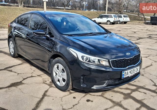 Чорний Кіа Форте, об'ємом двигуна 2 л та пробігом 122 тис. км за 11100 $, фото 1 на Automoto.ua