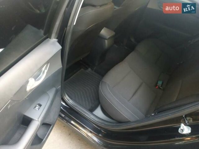 Черный Киа Форте, объемом двигателя 2 л и пробегом 130 тыс. км за 12100 $, фото 2 на Automoto.ua