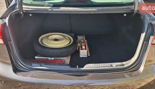 Коричневый Киа Форте, объемом двигателя 2 л и пробегом 46 тыс. км за 13000 $, фото 8 на Automoto.ua