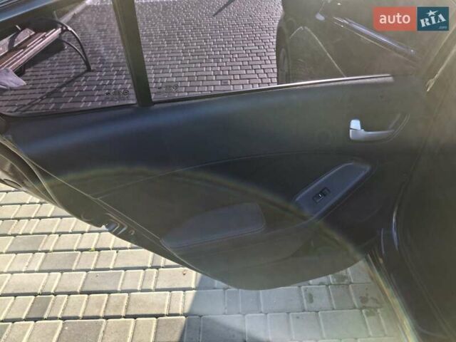 Коричневый Киа Форте, объемом двигателя 2 л и пробегом 242 тыс. км за 10000 $, фото 11 на Automoto.ua