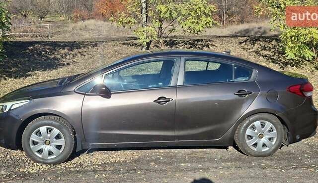 Коричневый Киа Форте, объемом двигателя 2 л и пробегом 46 тыс. км за 13000 $, фото 2 на Automoto.ua