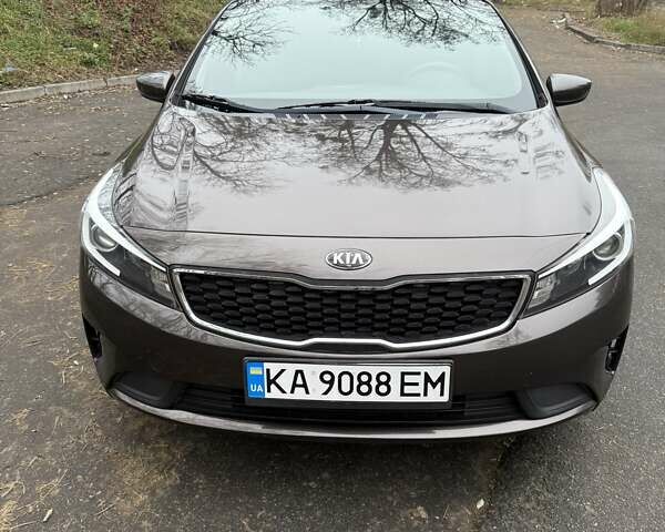 Коричневый Киа Форте, объемом двигателя 2 л и пробегом 107 тыс. км за 11000 $, фото 1 на Automoto.ua