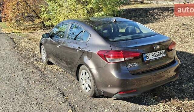 Коричневый Киа Форте, объемом двигателя 2 л и пробегом 46 тыс. км за 13000 $, фото 5 на Automoto.ua