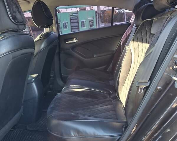 Коричневый Киа Форте, объемом двигателя 2 л и пробегом 242 тыс. км за 10000 $, фото 14 на Automoto.ua