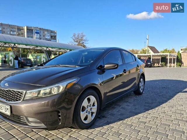 Коричневый Киа Форте, объемом двигателя 2 л и пробегом 242 тыс. км за 10000 $, фото 18 на Automoto.ua