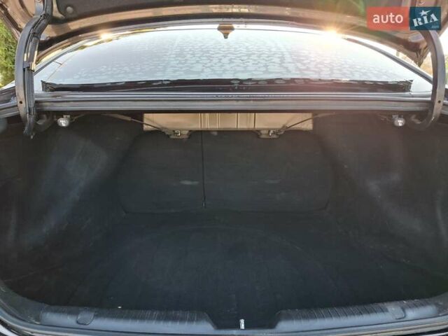 Коричневый Киа Форте, объемом двигателя 2 л и пробегом 242 тыс. км за 10000 $, фото 3 на Automoto.ua