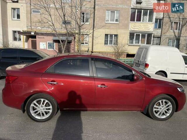 Красный Киа Форте, объемом двигателя 2 л и пробегом 206 тыс. км за 8000 $, фото 5 на Automoto.ua