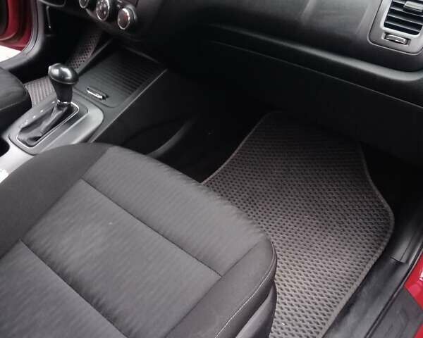 Красный Киа Форте, объемом двигателя 1.8 л и пробегом 77 тыс. км за 9999 $, фото 12 на Automoto.ua