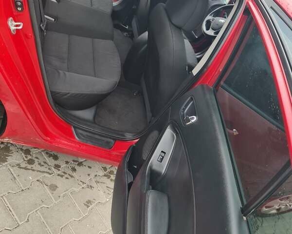 Червоний Кіа Форте, об'ємом двигуна 1.8 л та пробігом 232 тис. км за 7400 $, фото 7 на Automoto.ua
