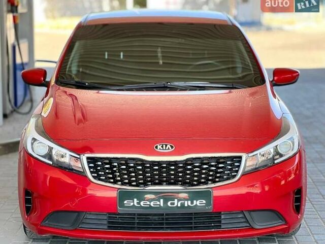 Червоний Кіа Форте, об'ємом двигуна 2 л та пробігом 138 тис. км за 9399 $, фото 1 на Automoto.ua