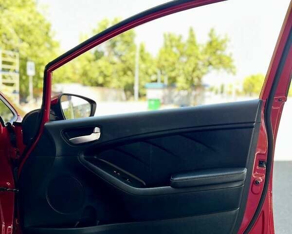 Червоний Кіа Форте, об'ємом двигуна 2 л та пробігом 138 тис. км за 9399 $, фото 15 на Automoto.ua