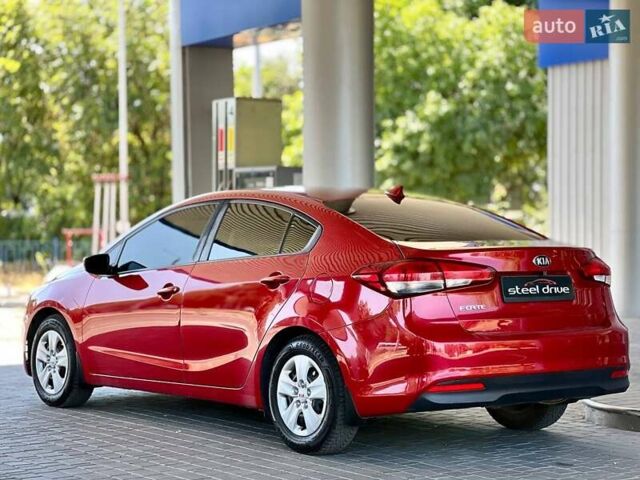 Червоний Кіа Форте, об'ємом двигуна 2 л та пробігом 138 тис. км за 9399 $, фото 3 на Automoto.ua