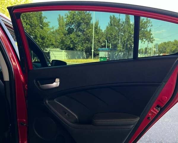 Червоний Кіа Форте, об'ємом двигуна 2 л та пробігом 138 тис. км за 9399 $, фото 19 на Automoto.ua