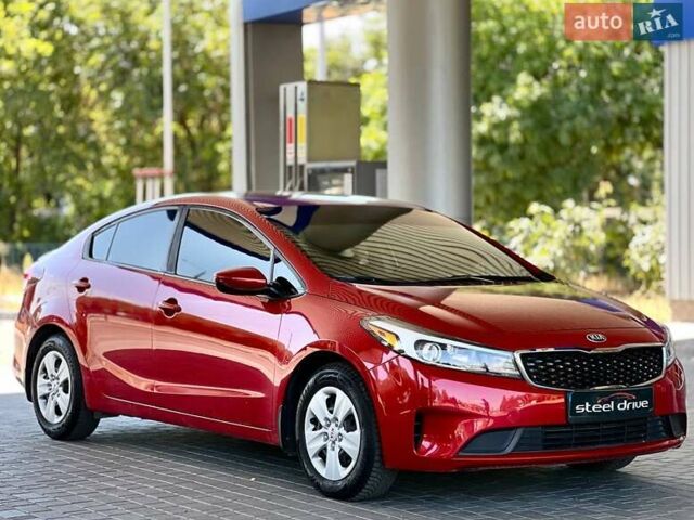 Червоний Кіа Форте, об'ємом двигуна 2 л та пробігом 138 тис. км за 9399 $, фото 2 на Automoto.ua