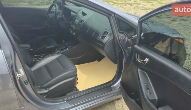 Сірий Кіа Форте, об'ємом двигуна 1.6 л та пробігом 87 тис. км за 14000 $, фото 27 на Automoto.ua