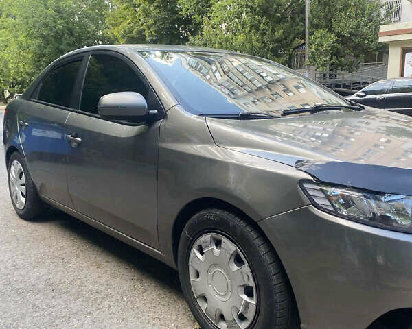 Серый Киа Форте, объемом двигателя 2 л и пробегом 311 тыс. км за 6999 $, фото 3 на Automoto.ua