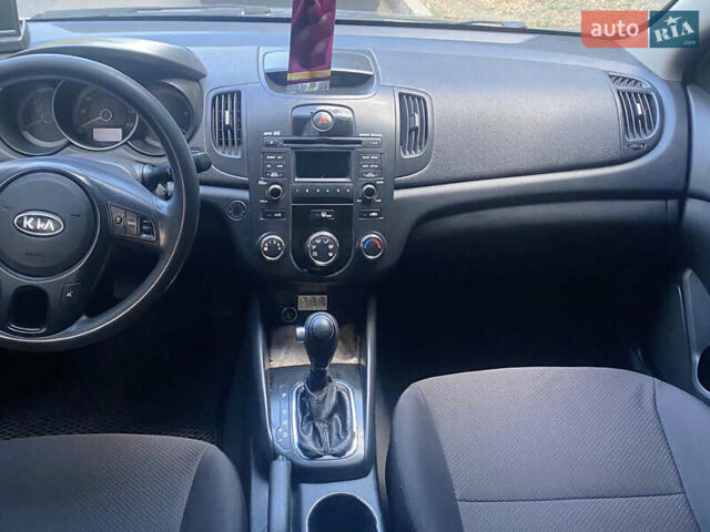 Серый Киа Форте, объемом двигателя 2 л и пробегом 311 тыс. км за 6999 $, фото 8 на Automoto.ua