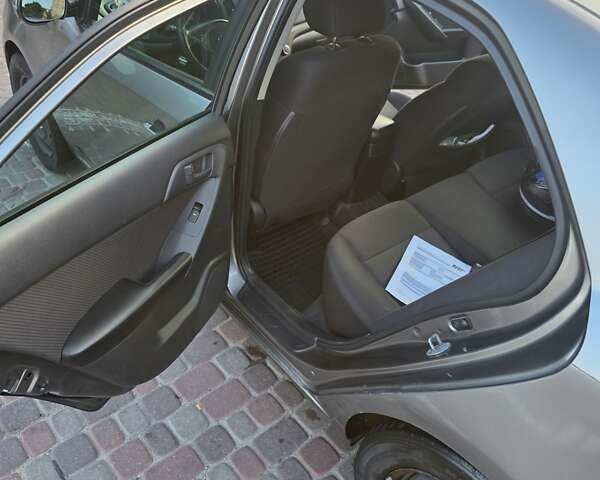 Серый Киа Форте, объемом двигателя 2 л и пробегом 247 тыс. км за 8000 $, фото 2 на Automoto.ua