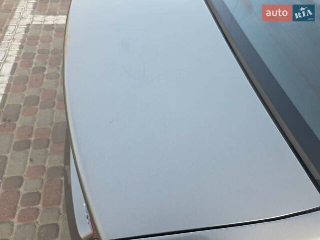 Серый Киа Форте, объемом двигателя 2 л и пробегом 247 тыс. км за 8000 $, фото 12 на Automoto.ua