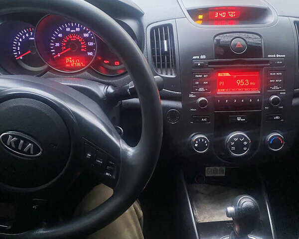 Серый Киа Форте, объемом двигателя 2 л и пробегом 311 тыс. км за 6999 $, фото 9 на Automoto.ua