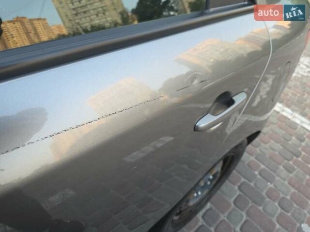 Серый Киа Форте, объемом двигателя 2 л и пробегом 247 тыс. км за 8000 $, фото 10 на Automoto.ua