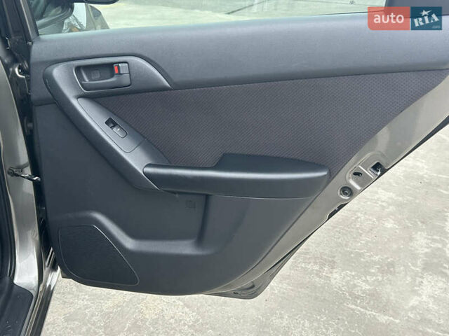 Серый Киа Форте, объемом двигателя 2 л и пробегом 250 тыс. км за 7200 $, фото 29 на Automoto.ua