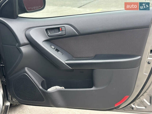 Серый Киа Форте, объемом двигателя 2 л и пробегом 250 тыс. км за 7200 $, фото 32 на Automoto.ua