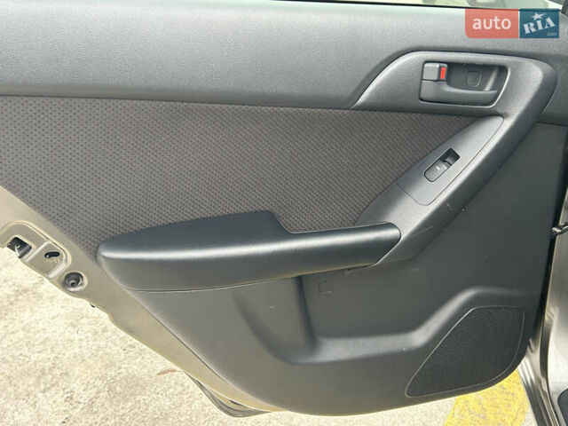 Серый Киа Форте, объемом двигателя 2 л и пробегом 250 тыс. км за 7200 $, фото 27 на Automoto.ua