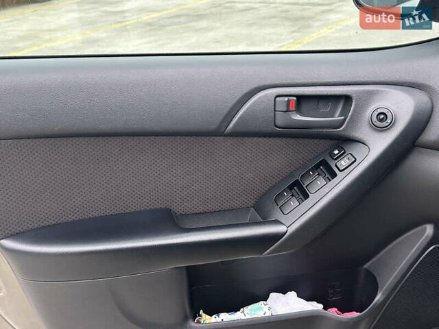 Серый Киа Форте, объемом двигателя 2 л и пробегом 250 тыс. км за 7200 $, фото 24 на Automoto.ua