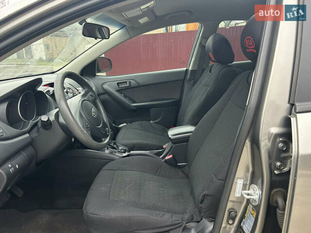 Серый Киа Форте, объемом двигателя 2 л и пробегом 250 тыс. км за 7200 $, фото 22 на Automoto.ua