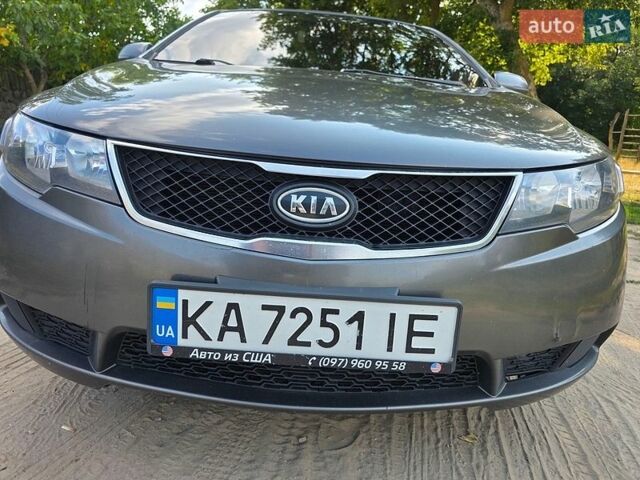 Серый Киа Форте, объемом двигателя 2 л и пробегом 286 тыс. км за 6600 $, фото 12 на Automoto.ua