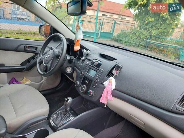 Серый Киа Форте, объемом двигателя 2 л и пробегом 166 тыс. км за 7600 $, фото 3 на Automoto.ua